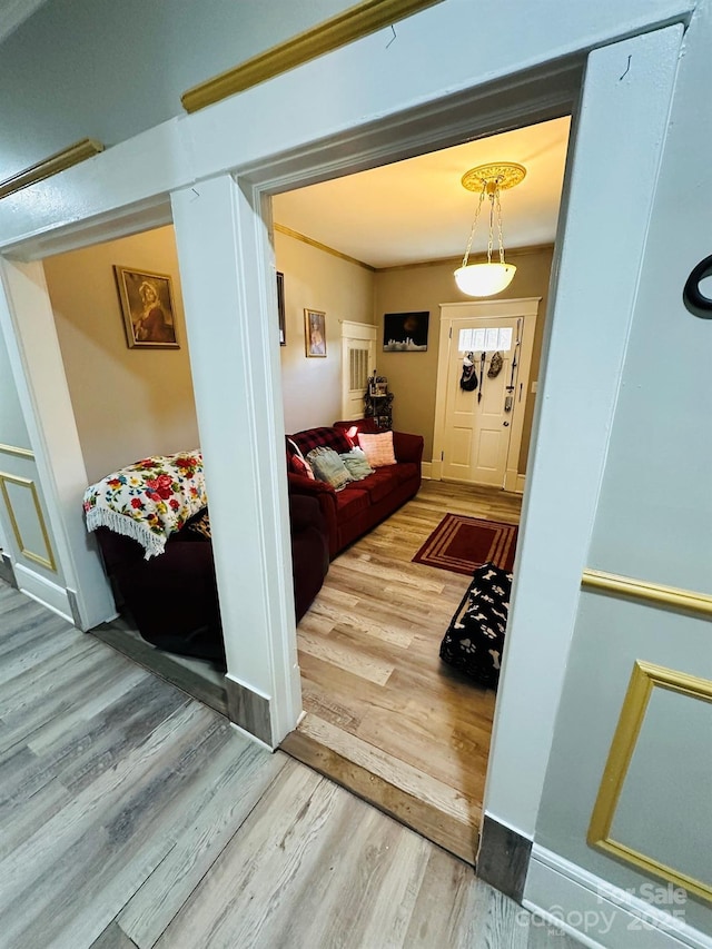 corridor with wood-type flooring