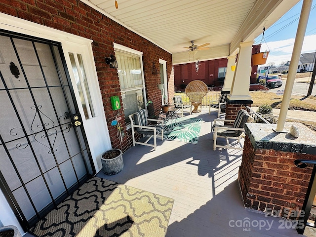 view of patio / terrace featuring covered porch and ceiling fan