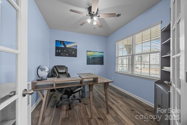 office area with ceiling fan and dark hardwood / wood-style flooring