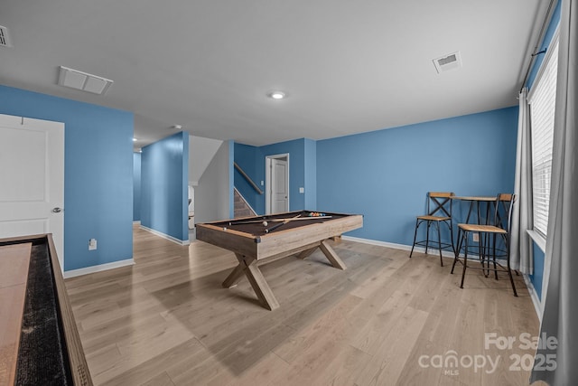 playroom featuring pool table, plenty of natural light, and light wood-type flooring