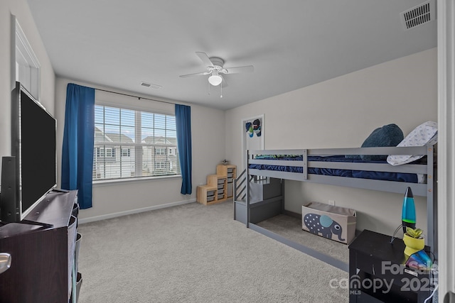 carpeted bedroom with ceiling fan