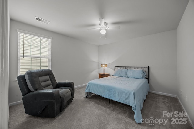 bedroom with ceiling fan and carpet floors