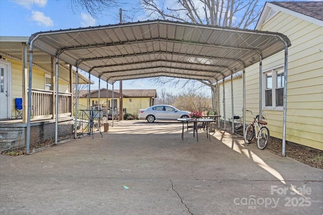 view of parking / parking lot with a carport