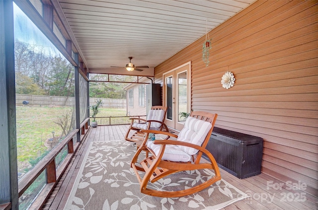 sunroom / solarium with ceiling fan