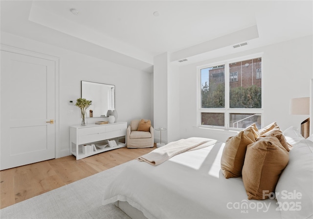 bedroom featuring hardwood / wood-style flooring