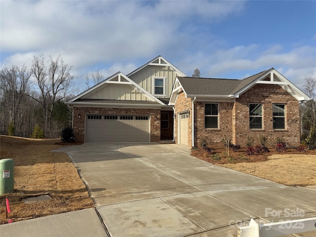 craftsman house with a garage