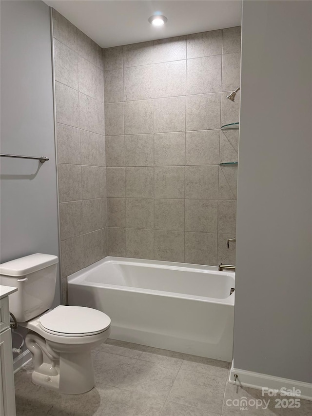 full bathroom with shower / tub combination, toilet, tile patterned flooring, and vanity