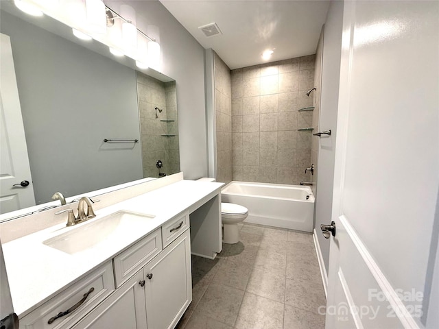 full bathroom with visible vents, toilet, washtub / shower combination, tile patterned flooring, and vanity