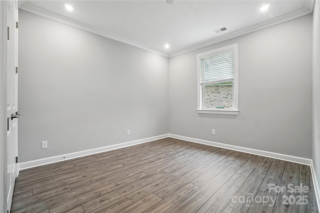 9657 Liberty Hill Dr, Mint Hill, NC 28227 - unfurnished room featuring ornamental molding, dark wood-type flooring, baseboards, and recessed lighting