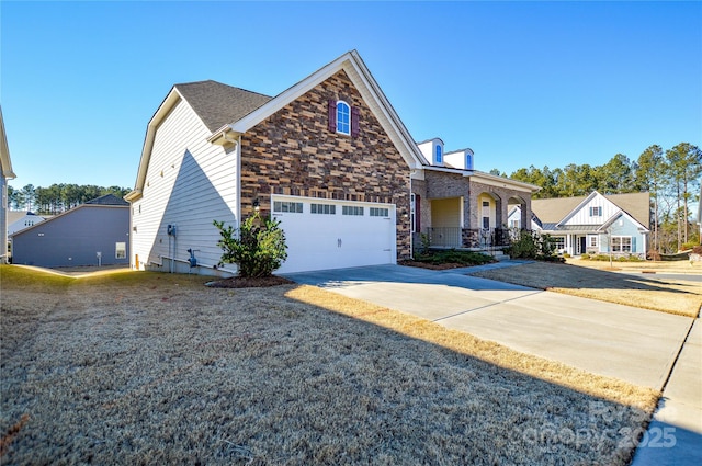 view of front facade featuring a front yard and a garage