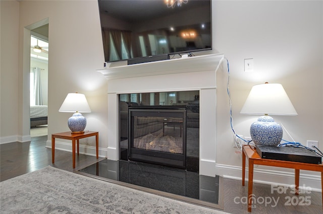 interior details featuring hardwood / wood-style flooring