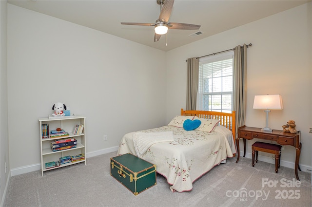 bedroom with ceiling fan and carpet floors