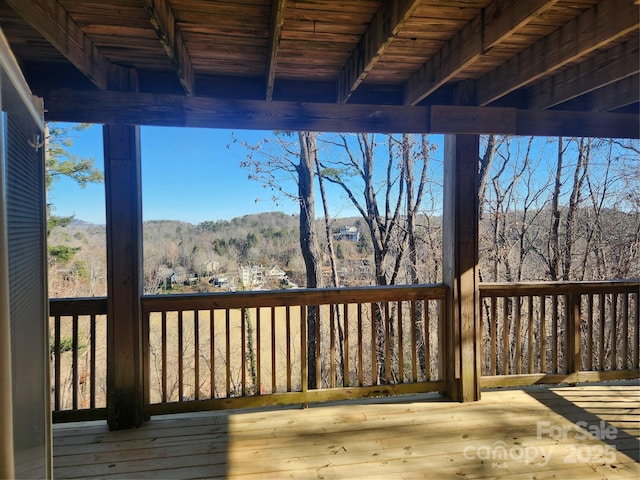 wooden terrace with a mountain view