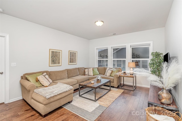 living room featuring dark hardwood / wood-style flooring