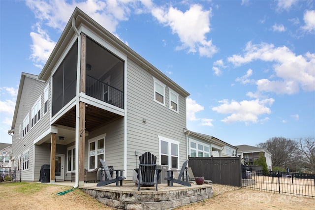 rear view of house featuring a patio area