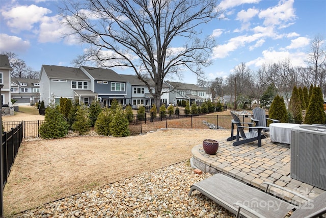 view of yard featuring a patio area and cooling unit