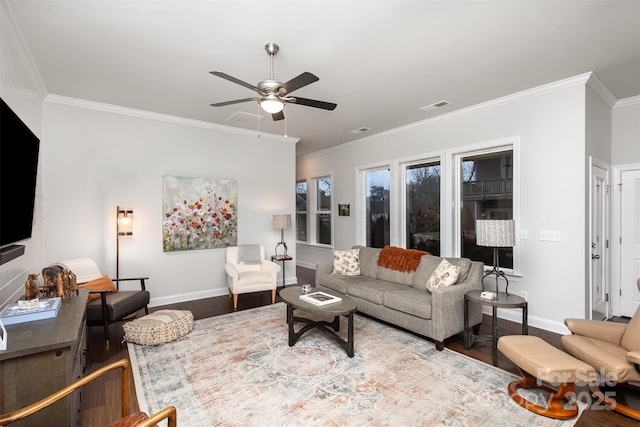 living room with ceiling fan, hardwood / wood-style floors, and ornamental molding