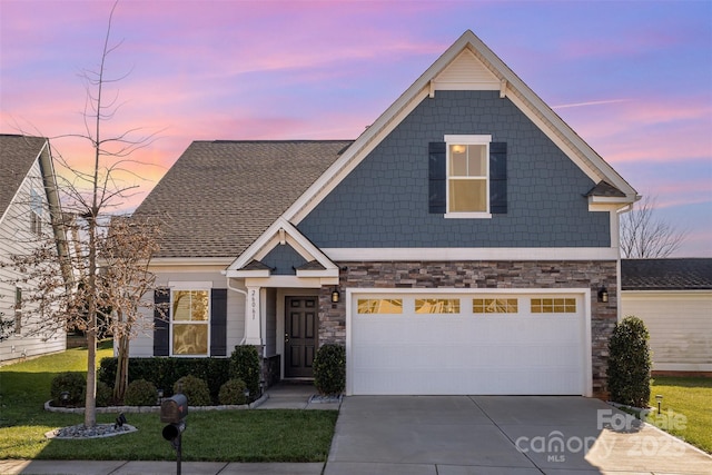 craftsman inspired home featuring a garage