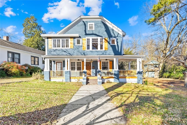 view of front of property with a front lawn and a porch