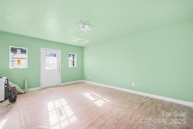 interior space with ceiling fan