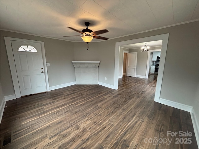 unfurnished living room with dark hardwood / wood-style flooring, crown molding, and ceiling fan with notable chandelier