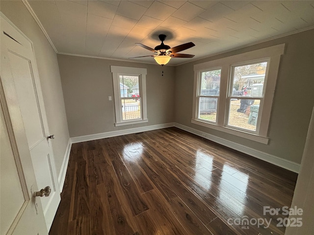 unfurnished bedroom with ceiling fan, dark hardwood / wood-style flooring, and ornamental molding