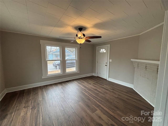 unfurnished living room featuring ceiling fan, dark wood-type flooring, and ornamental molding