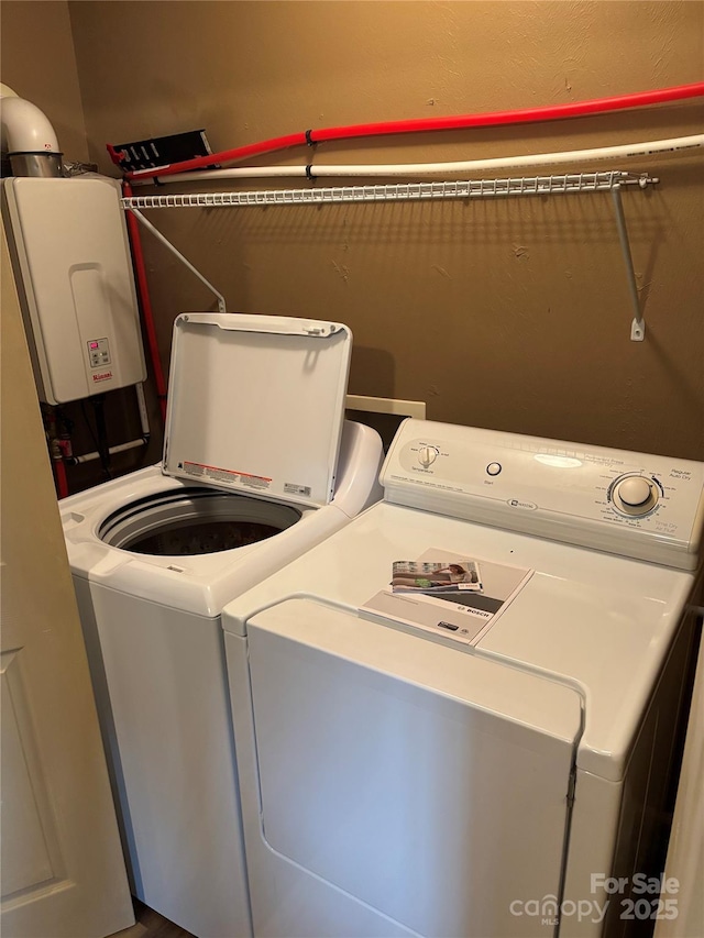 washroom with washer and clothes dryer