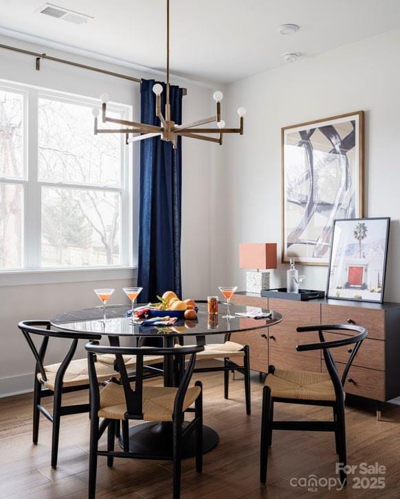 dining space featuring hardwood / wood-style flooring