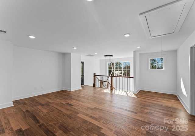 empty room featuring dark hardwood / wood-style floors