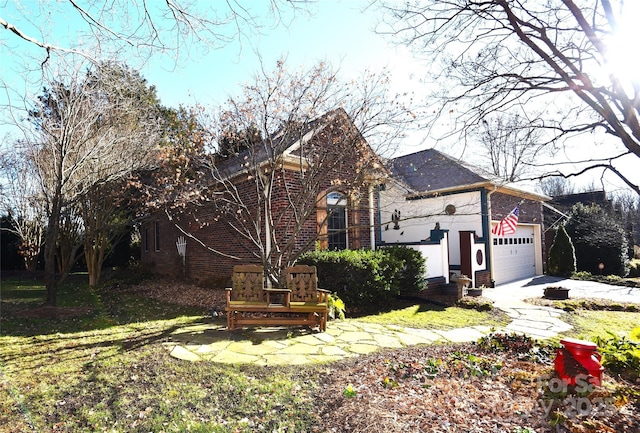 view of front of property featuring a garage