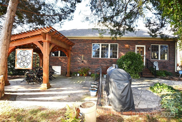 exterior space with a patio and a pergola