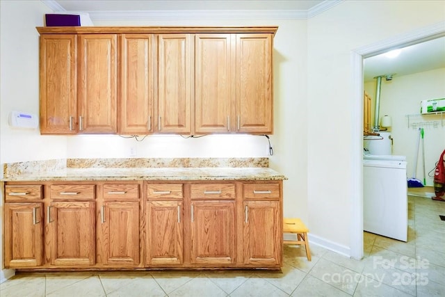 kitchen with light stone countertops, light tile patterned floors, and crown molding