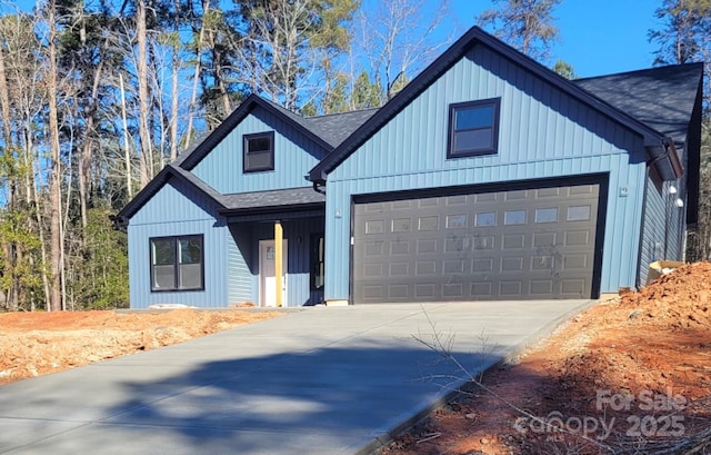 modern farmhouse with a garage