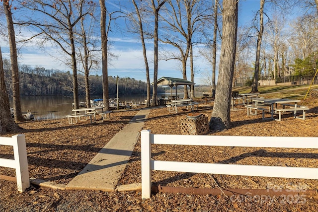 view of yard featuring a water view and a gazebo