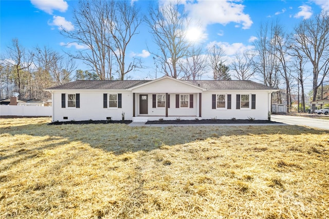 ranch-style house featuring crawl space, a front yard, and fence