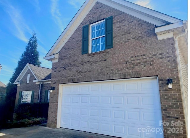 view of home's exterior with a garage