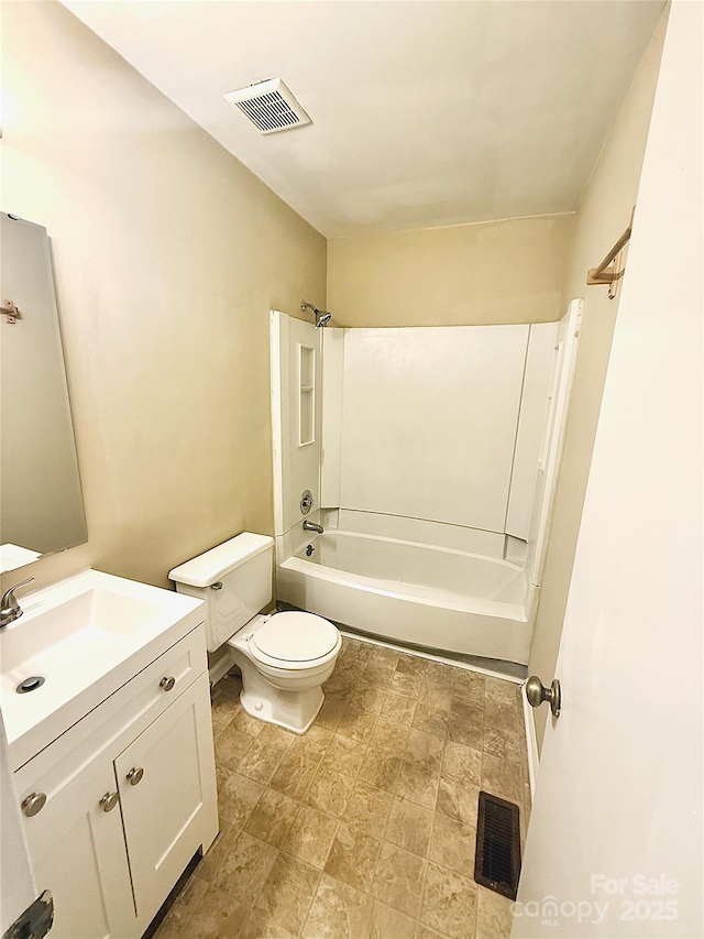 full bathroom with toilet, vanity, and bathing tub / shower combination