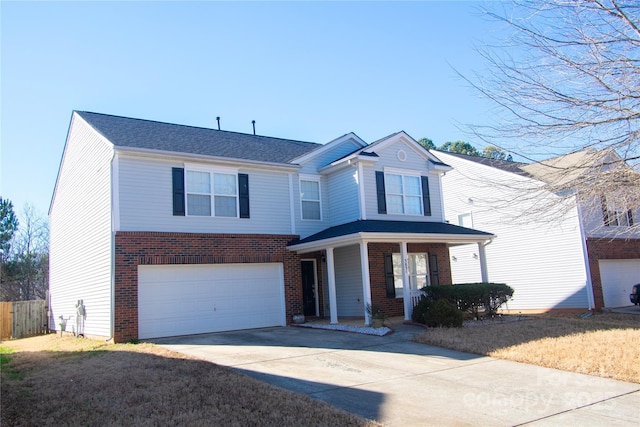 view of front of house with a garage and covered porch