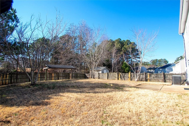 view of yard featuring central AC