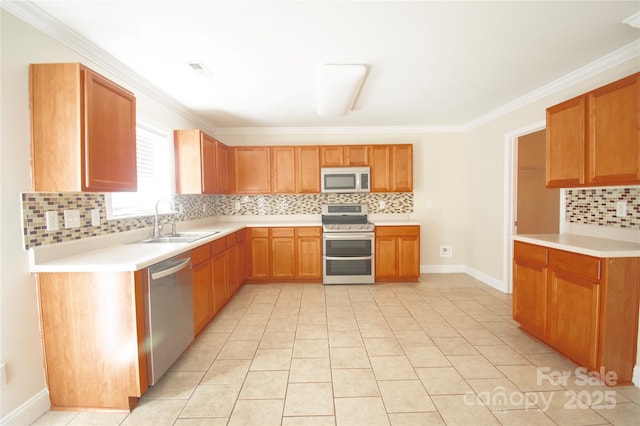 kitchen with sink, tasteful backsplash, light tile patterned floors, ornamental molding, and stainless steel appliances