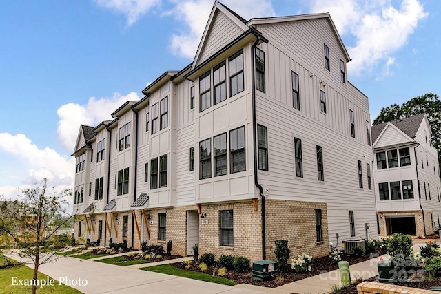 view of building exterior featuring central AC unit