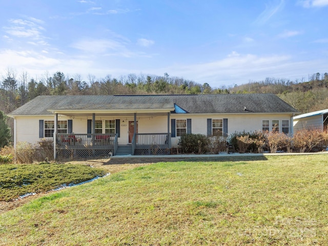 single story home featuring a front lawn and a porch