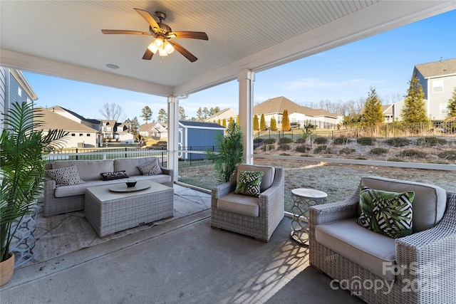 view of patio / terrace with ceiling fan and outdoor lounge area