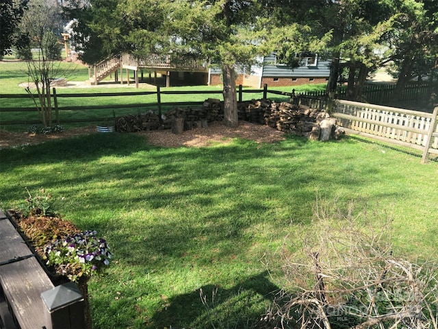 view of yard with fence