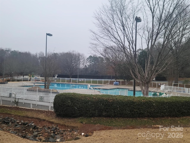 pool featuring fence