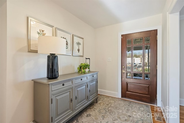 doorway featuring light hardwood / wood-style flooring