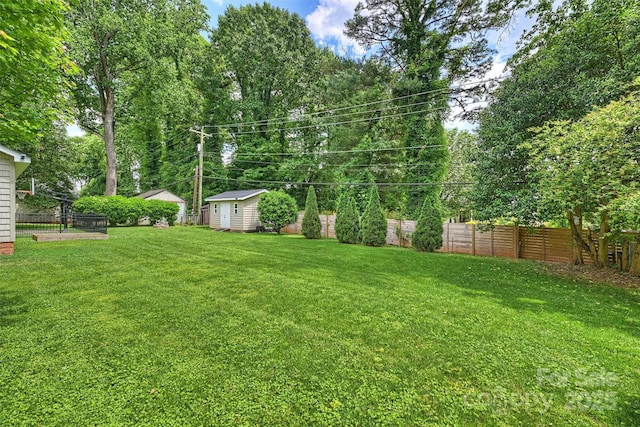 7135 Folger Dr, Charlotte, NC 28270 - view of yard with a storage shed and an outdoor structure