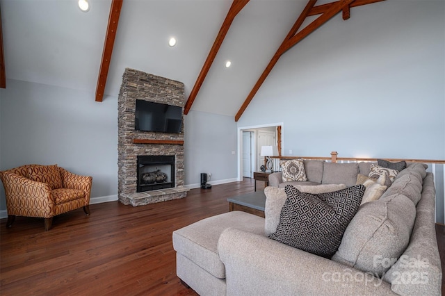 living room featuring dark wood-type flooring, beam ceiling, a fireplace, and high vaulted ceiling