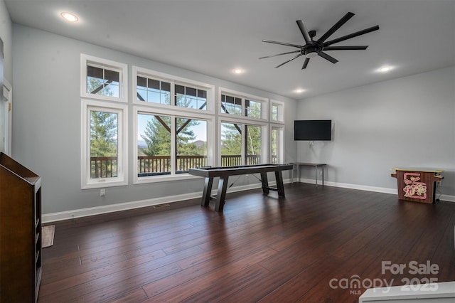 rec room with ceiling fan, billiards, and dark hardwood / wood-style flooring